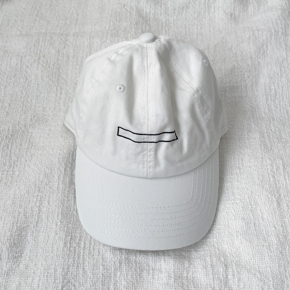 White with black embroidery dad hat